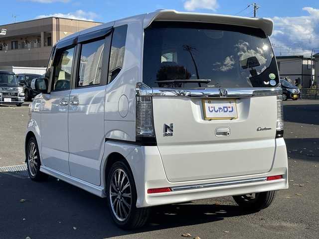 ホンダ Ｎ ＢＯＸ カスタム G ターボ Lパッケージ 宮城県 2015(平27)年 7.5万km プレミアムホワイトパールⅡ (株)IDOMが運営する【じしゃロン仙台店】の自社ローン専用車両になりますこちらは現金またはオートローンご利用時の価格です。自社ローンご希望の方は別途その旨お申付け下さい/SDナビ/Bluetooth/両側パワースライドドア/バックカメラ/ハーフレザーシート/プッシュスタート