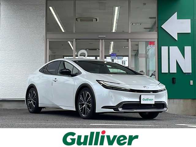 トヨタ プリウス G 愛知県 2023(令5)年 3.6万km プラチナホワイトパールマイカ 禁煙車/純正メーカーナビ/フルセグ/アダプティプクルーズコントロール/ブラインドスポットモニター/デジタルインナーミラー/パノラミックビューモニター/ETC/前後コーナーセンサー/クリアランスソナー/寒冷地仕様/Bluetooth/ステアリングリモコン/オートライト/オートハイビーム/LEDヘッドライト/100V充電/シートヒーター（D/N席）/純正アルミ/純正フロアマット/スペアキー/取説/保証書
