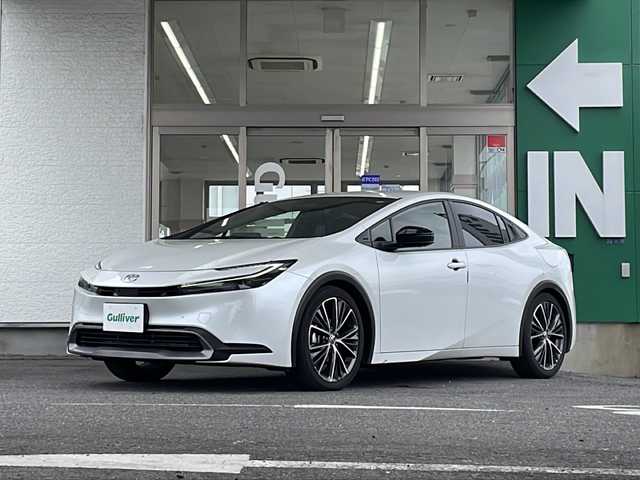 トヨタ プリウス G 愛知県 2023(令5)年 3.6万km プラチナホワイトパールマイカ 禁煙車/純正メーカーナビ/フルセグ/アダプティプクルーズコントロール/ブラインドスポットモニター/デジタルインナーミラー/パノラミックビューモニター/ETC/前後コーナーセンサー/クリアランスソナー/寒冷地仕様/Bluetooth/ステアリングリモコン/オートライト/オートハイビーム/LEDヘッドライト/100V充電/シートヒーター（D/N席）/純正アルミ/純正フロアマット/スペアキー/取説/保証書