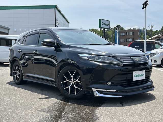 トヨタ ハリアー プレミアム スタイルノアール 石川県 2019(令1)年 8.3万km ブラックマイカ ワンオーナー/セーフティセンス/・プリクラッシュセーフティシステム/・レーンディパーチャーアラート/・アダプティブハイビーム/・レーダークルーズコントロール/・インテリアクリアランスソナー/ムーンルーフ/社外10インチメモリナビゲーション/【CD・DVD・Bluetooth・・SD・フルセグTV】/型番：EX10Z/黒革シート/運転席パワーシート/モデリスタフルエアロ/パワーバックドア/ビルトインETC/社外ドライブレコーダー/スマートキー/・プッシュスタート/・スペアキー/・カードキー/純正フロアマット/純正ドアバイザー/取扱説明書/新車時保証書