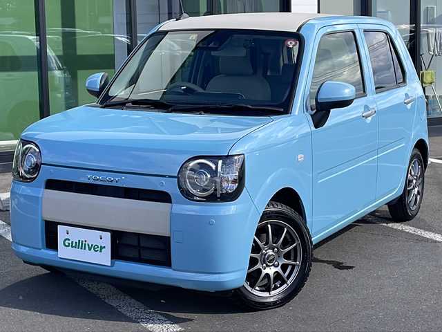 ダイハツ ミラ トコット X SA Ⅲ 道東・釧路十勝 2018(平30)年 1.9万km サニーデイブルーメタリック ・４WD/・純正8インチメモリーナビ/（CD/DVD/BT/FM/AM/USB/SD）/・フルセグ/・バックカメラ/・スマートアシスト/衝突回避支援ブレーキ/前後誤発進抑制/ヒルホールドシステム/先行車発発進お知らせ/・純正前方ドライブレコーダー（DRN-H68N）/・アイドリングストップ/・横滑り防止/・前後コーナーセンサー/・LEDヘッドライト/・オートライト/・オートマチックハイビーム/・電動格納ミラー/・プッシュスタート/・スマートキー/・ダブル+サイドエアバッグ