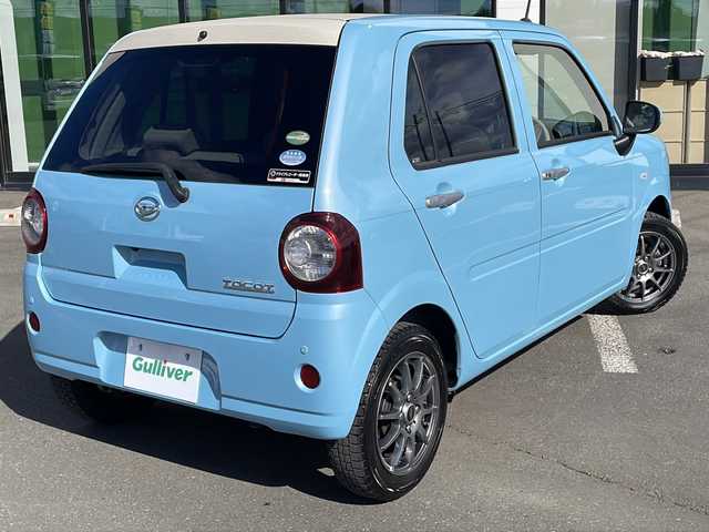 ダイハツ ミラ トコット X SA Ⅲ 道東・釧路十勝 2018(平30)年 1.9万km サニーデイブルーメタリック ・４WD/・純正8インチメモリーナビ/（CD/DVD/BT/FM/AM/USB/SD）/・フルセグ/・バックカメラ/・スマートアシスト/衝突回避支援ブレーキ/前後誤発進抑制/ヒルホールドシステム/先行車発発進お知らせ/・純正前方ドライブレコーダー（DRN-H68N）/・アイドリングストップ/・横滑り防止/・前後コーナーセンサー/・LEDヘッドライト/・オートライト/・オートマチックハイビーム/・電動格納ミラー/・プッシュスタート/・スマートキー/・ダブル+サイドエアバッグ