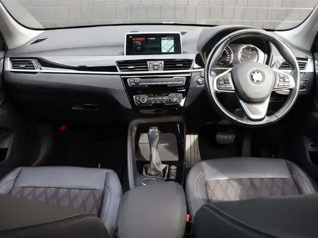 ＢＭＷ Ｘ１ xDrive 18d xライン 宮城県 2018(平30)年 6.7万km サファイアブラックP 純正ナビ【ＢＴ／ＡＵＸ】/インテリジェントセーフティ　/アダプティブクルーズコントロール　/ハーフレザーシート　/バックカメラ　/ヘッドアップディスプレイ　/アンビエントライト　/シートヒーター前席　/パーキングアシスト/パワーバックドア/ダウンヒルアシストコントロール/ルーフレール/レーンキープアシスト/ミラー型ETC/LEDヘッドライト/コンフォートアクセス/コーナーセンサー前後/禁煙車