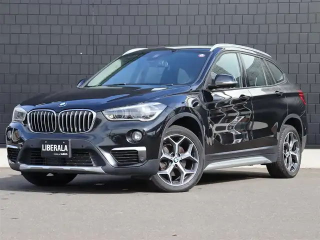 ＢＭＷ Ｘ１ xDrive 18d xライン 宮城県 2018(平30)年 6.7万km サファイアブラックP 純正ナビ【ＢＴ／ＡＵＸ】/インテリジェントセーフティ　/アダプティブクルーズコントロール　/ハーフレザーシート　/バックカメラ　/ヘッドアップディスプレイ　/アンビエントライト　/シートヒーター前席　/パーキングアシスト/パワーバックドア/ダウンヒルアシストコントロール/ルーフレール/レーンキープアシスト/ミラー型ETC/LEDヘッドライト/コンフォートアクセス/コーナーセンサー前後/禁煙車