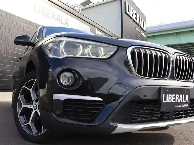 ＢＭＷ Ｘ１ xDrive 18d xライン 宮城県 2018(平30)年 6.7万km サファイアブラックP 純正ナビ【ＢＴ／ＡＵＸ】/インテリジェントセーフティ　/アダプティブクルーズコントロール　/ハーフレザーシート　/バックカメラ　/ヘッドアップディスプレイ　/アンビエントライト　/シートヒーター前席　/パーキングアシスト/パワーバックドア/ダウンヒルアシストコントロール/ルーフレール/レーンキープアシスト/ミラー型ETC/LEDヘッドライト/コンフォートアクセス/コーナーセンサー前後/禁煙車