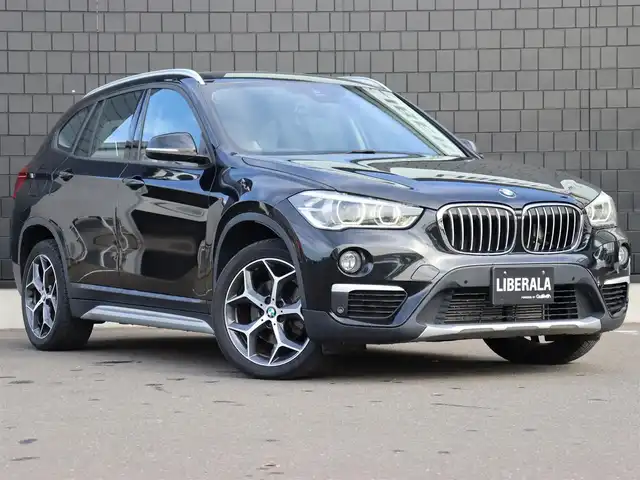 ＢＭＷ Ｘ１ xDrive 18d xライン 宮城県 2018(平30)年 6.7万km サファイアブラックP 純正ナビ【ＢＴ／ＡＵＸ】/インテリジェントセーフティ　/アダプティブクルーズコントロール　/ハーフレザーシート　/バックカメラ　/ヘッドアップディスプレイ　/アンビエントライト　/シートヒーター前席　/パーキングアシスト/パワーバックドア/ダウンヒルアシストコントロール/ルーフレール/レーンキープアシスト/ミラー型ETC/LEDヘッドライト/コンフォートアクセス/コーナーセンサー前後/禁煙車