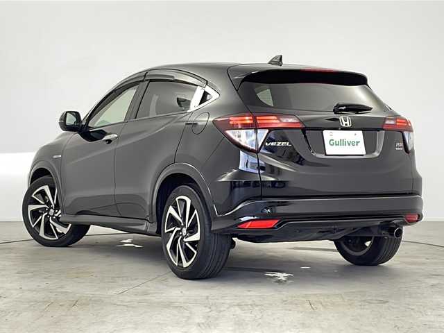 ホンダ ヴェゼル ハイブリッド RS ホンダセンシング 愛知県 2016(平28)年 6.8万km クリスタルブラックパール 純正ナビ/【Bluetooth/フルセグTV/CD/DVD/AM/FM/USB】/バックカメラ/衝突被害軽減ブレーキ/レーンアシスト/レーダークルーズコントロール/横滑り防止装置/パドルシフト/ハーフレザーシート/前席シートヒーター/カーテンエアバック/オートエアコン/ETC/プッシュスタート/ステアリングスイッチ/スマートキー/電動格納ミラー/純正18インチアルミホイール/純正LEDオートライト