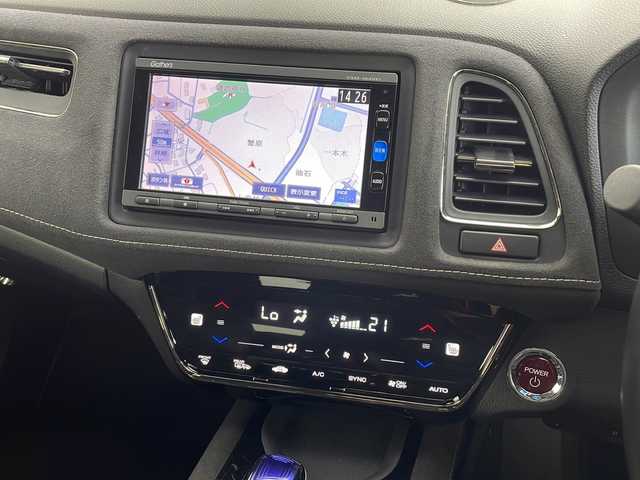 ホンダ ヴェゼル ハイブリッド RS ホンダセンシング 愛知県 2016(平28)年 6.8万km クリスタルブラックパール 純正ナビ/【Bluetooth/フルセグTV/CD/DVD/AM/FM/USB】/バックカメラ/衝突被害軽減ブレーキ/レーンアシスト/レーダークルーズコントロール/横滑り防止装置/パドルシフト/ハーフレザーシート/前席シートヒーター/カーテンエアバック/オートエアコン/ETC/プッシュスタート/ステアリングスイッチ/スマートキー/電動格納ミラー/純正18インチアルミホイール/純正LEDオートライト