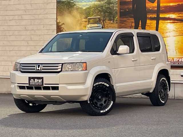 ホンダ クロスロード 20Xi 愛知県 2008(平20)年 7.1万km プレミアムホワイトパール AIS検査済み/【2502026429】社外パーツ取付有/エクストリームJ XJ07（サテンブラック）社外/モンスタ　テレーングリッパー（社外）/リフトアップキット（社外）/クリアサイドマーカー/純正HDDナビ/ETC/オートライト/キーレスキー/電動格納ミラー