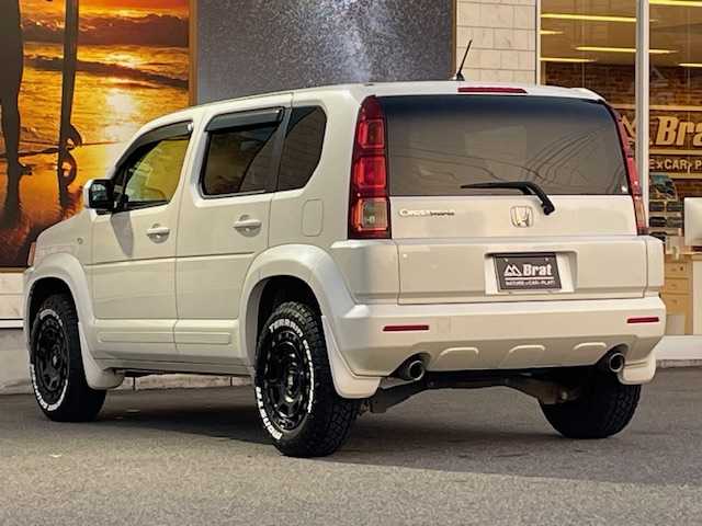 ホンダ クロスロード 20Xi 愛知県 2008(平20)年 7.1万km プレミアムホワイトパール AIS検査済み/【2502026429】社外パーツ取付有/エクストリームJ XJ07（サテンブラック）社外/モンスタ　テレーングリッパー（社外）/リフトアップキット（社外）/クリアサイドマーカー/純正HDDナビ/ETC/オートライト/キーレスキー/電動格納ミラー