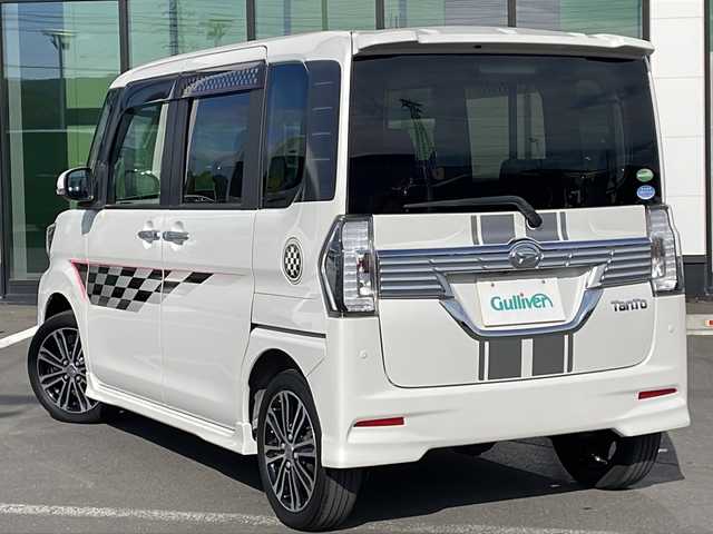 ダイハツ タント カスタムRS トップED LTD SAⅢ 道東・釧路十勝 2018(平30)年 6.7万km パールホワイトⅢ ・４WD/・ターボ/・純正8インチメモリナビ/（CD・DVD・BT・AM・FM・フルセグ）/・パノラミックビューカメラ/・両側パワースライドドア/・エンジンスターター/・ETC/・衝突被害軽減ブレーキ/・横滑り防止装置/・前席シートヒーター/・ハーフレザーシート/・純正フロアマット/・ドアバイザー/・LEDヘッドライト/・フロントフォグライト/・アイドリングストップ/・オートハイビーム/・オートライト/・スマートキー/・プッシュスタート/・革巻きステアリング
