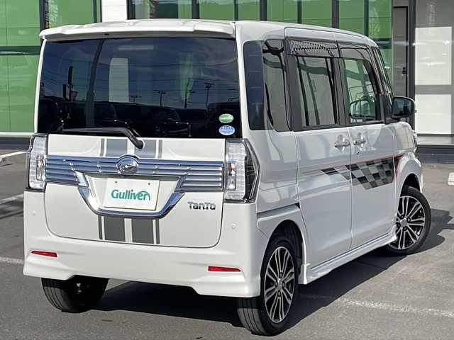 ダイハツ タント カスタムRS トップED LTD SAⅢ 道東・釧路十勝 2018(平30)年 6.7万km パールホワイトⅢ ・４WD/・ターボ/・純正8インチメモリナビ/（CD・DVD・BT・AM・FM・フルセグ）/・パノラミックビューカメラ/・両側パワースライドドア/・エンジンスターター/・ETC/・衝突被害軽減ブレーキ/・横滑り防止装置/・前席シートヒーター/・ハーフレザーシート/・純正フロアマット/・ドアバイザー/・LEDヘッドライト/・フロントフォグライト/・アイドリングストップ/・オートハイビーム/・オートライト/・スマートキー/・プッシュスタート/・革巻きステアリング