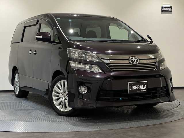 トヨタ ヴェルファイア 2．4Z 新潟県 2012(平24)年 16.6万km ボルドーマイカメタリック プッシュスタート/パワーステアリング/パワーウィンドウ/スマートキー/Wオートエアコン/後席モニター/ETC/バックカメラ/フルセグTV/SDナビ/3列シート/チップアップシート/純正フロアマット/布シート/両側パワースライドドア/純正アルミホイール/ABS/横滑り防止装置/コーナーセンサー前後/オートライト/キセノンヘッドライト/W+サイドエアバック/カーテンエアバック