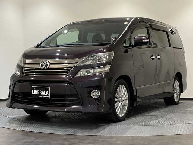 トヨタ ヴェルファイア 2．4Z 新潟県 2012(平24)年 16.6万km ボルドーマイカメタリック プッシュスタート/パワーステアリング/パワーウィンドウ/スマートキー/Wオートエアコン/後席モニター/ETC/バックカメラ/フルセグTV/SDナビ/3列シート/チップアップシート/純正フロアマット/布シート/両側パワースライドドア/純正アルミホイール/ABS/横滑り防止装置/コーナーセンサー前後/オートライト/キセノンヘッドライト/W+サイドエアバック/カーテンエアバック