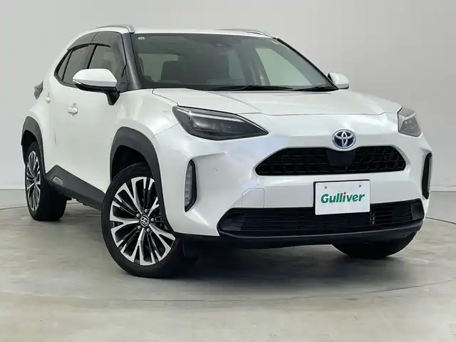 トヨタ ヤリスクロス ハイブリッド Z 新潟県 2021(令3)年 6.2万km ホワイトパールクリスタルシャイン 4WD/純正メモリナビ/　Bluetooth/CD/DVD/USB/トヨタセーフティセンス/・プリクラッシュセーフティ/・レーントレーシングアシスト/・レーンディパーチャーアラート/・レーダークルーズコントロール/・アダプティブハイビームシステム/・ロードサインアシスト/・レーダークルーズコントロール/D席パワーシート/ハーフレザーシート/前席シートヒーター/バックモニター/ETC/ダウンヒルアシストコントロール/LEDヘッドライト/レザーステアリング