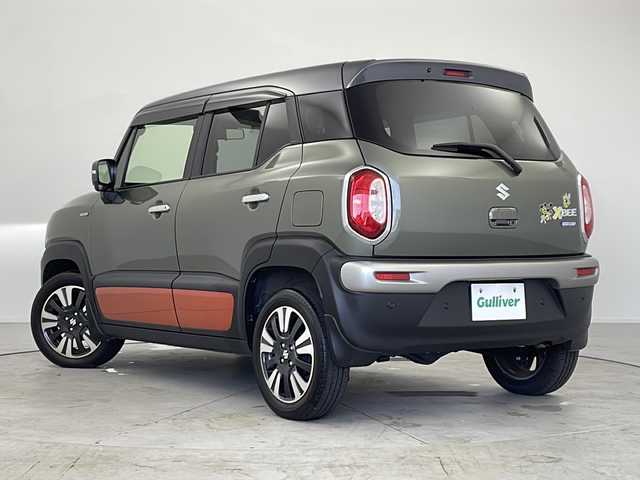 スズキ クロスビー 愛知県 2023(令5)年 1.5万km タフカーキパールメタリック 純正8インチナビ/【Bluetooth/フルセグTV/CD/DVD/USB】/スズキセーフディサポート/・デュアルカメラブレーキサポート/・アダプティブクルーズコントロール（全車速追従機能付）/・誤発進抑制機能/・リヤパーキングセンサー/・全方位モニターカメラ/レーンアシスト/ダウンヒルアシストコントロール/アイドリングストップ/パドルシフト/横滑り防止装置/ハーフレザーシート/シートヒーター（D/N）/ETC/オートエアコン/ステアリングスイッチ/スマートキー/スペアキー/プッシュスタート/純正16インチアルミホイール/純正LEDオートライト/電動格納ミラー/ドアバイザー