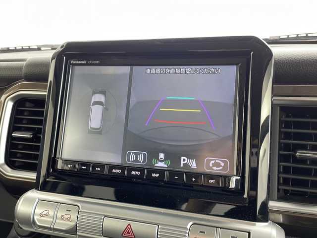 スズキ クロスビー 愛知県 2023(令5)年 1.5万km タフカーキパールメタリック 純正8インチナビ/【Bluetooth/フルセグTV/CD/DVD/USB】/スズキセーフディサポート/・デュアルカメラブレーキサポート/・アダプティブクルーズコントロール（全車速追従機能付）/・誤発進抑制機能/・リヤパーキングセンサー/・全方位モニターカメラ/レーンアシスト/ダウンヒルアシストコントロール/アイドリングストップ/パドルシフト/横滑り防止装置/ハーフレザーシート/シートヒーター（D/N）/ETC/オートエアコン/ステアリングスイッチ/スマートキー/スペアキー/プッシュスタート/純正16インチアルミホイール/純正LEDオートライト/電動格納ミラー/ドアバイザー