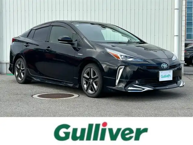 トヨタ プリウス Sツーリングセレクション 富山県 2020(令2)年 7.4万km アティチュードブラックマイカ 社外SDナビ(CN-RA03WD)/(AM/FM/CD/DVD/ipod)/フルセグTV/バックカメラ/Bluetooth/モデリスタエアロ/レーダークルーズコントロール/衝突軽減システム/コーナーセンサー/レーンキープアシスト/オートマチックハイビーム/横滑り防止装置/盗難防止装置/ETC/シートヒーター　運転席+助手席/合皮シート/フロアマット純正/純正AW/LEDオートライト/スマートキー×1/取扱説明書/保証書