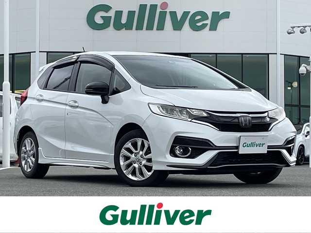 ホンダ フィット 13G S ホンダセンシング 佐賀県 2019(令1)年 7.1万km プラチナホワイトパール ワンオーナー/純正メモリーナビゲーション/・フルセグTV/CD/DVD/SD/USB/Bluetooth/バックカメラ/ビルトインETC/純正フルエアロ/ISOFIX対応/パドルシフト/ステアリングリモコン/純正15インチアルミホイール/純正LEDヘッドライト/純正LEDフォグランプ/純正フロアマット/純正ドアバイザ―/新車保証書/取扱説明書/スペアキー１本/ホンダセンシング/・アダプティブクルーズコントロール/・衝突被害軽減ブレーキ/・先行車発進お知らせ機能/・路外逸脱抑制機能/・標識認識機能