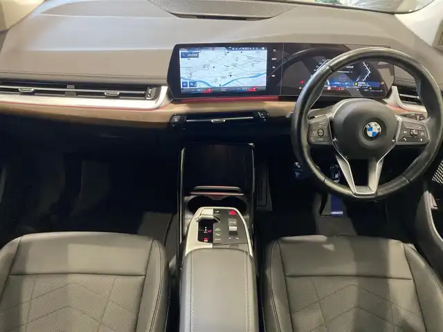 ＢＭＷ ＢＭＷ ２１８ｉ アクティブツアラー エクスクルーシブ 熊本県 2023(令5)年 2.4万km グレー ・スマートキー/・プッシュスタート/・インテリジェントセーフティ/・パークアシスト/・PDC自動起動/・アクティブPDC緊急ブレーキ/・レーンチェンジアシスト/・降車警告/・コーナーセンサー/・オートハイビーム/・クルーズコントロール(追従式)/・黒革シート/・前席パワーシート/・前席シートヒーター /・純正メモリナビ/　【Bluetooth・USB・AppleCarPlay】/・バックカメラ/・ETC/・ドライブレコーダー(前後録画)/・ワイヤレス充電/・LEDヘッドランプ/・保証書/取説