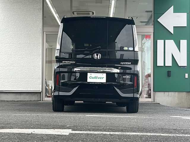ホンダ ステップワゴン eHEVモデューロX ホンダS 愛知県 2021(令3)年 5.4万km プレミアムスパークルブラックパール 禁煙車/ワンオーナー/純正10インチプレミアムインターナビ、TV/バックカメラ（全方位）/ETC2.0/パーキングアシスト/フルセグ/Bluetooth/ドライブレコーダー/両側パワースライドドア/シートヒーター（D/N席）/純正フロアマット/純正AW/ドアバイザー/LEDヘッドライト/ステアリモコン/スペアキー/電格ミラー/取説/保証書