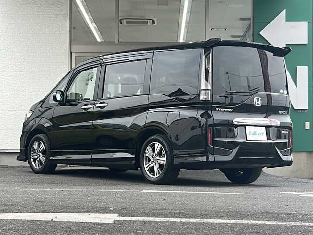 ホンダ ステップワゴン eHEVモデューロX ホンダS 愛知県 2021(令3)年 5.4万km プレミアムスパークルブラックパール 禁煙車/ワンオーナー/純正10インチプレミアムインターナビ、TV/バックカメラ（全方位）/ETC2.0/パーキングアシスト/フルセグ/Bluetooth/ドライブレコーダー/両側パワースライドドア/シートヒーター（D/N席）/純正フロアマット/純正AW/ドアバイザー/LEDヘッドライト/ステアリモコン/スペアキー/電格ミラー/取説/保証書