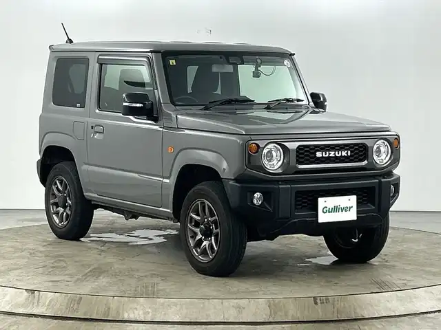 スズキ ジムニー XC 愛知県 2020(令2)年 3.2万km ミディアムグレー 純正7インチナビ/・フルセグTV/・バックカメラ/・Bluetooth/ビルトインETC/ドライブレコーダー/スズキセーフティサポート/クルーズコントロール/LEDヘッドライト/純正16インチアルミホイール/革巻きステアリング/SRSエアバッグ/撥水加工ファブリックシート/シートヒーター/スマートキー/プッシュスタート