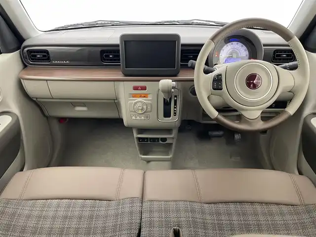 スズキ ラパン ＬＣ X 愛知県 2023(令5)年 0.1万km トラッドカーキメタリック/アーバンブラウン 2トーン デュアルカメラブレーキサポート　禁煙車　ハーフレザー　シートヒーター　ツートンカラー　衝突軽減　車線逸脱　リヤパーキングセンサー　ＬＥＤオートライト　プッシュスタート　ＵＳＢポート　ナノイーＸエアコン