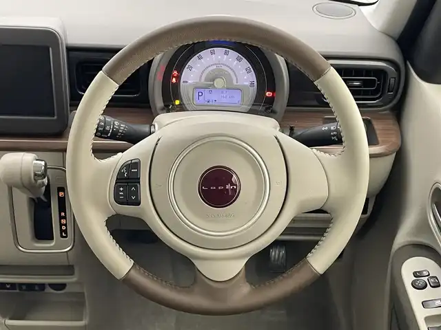 スズキ ラパン ＬＣ X 愛知県 2023(令5)年 0.1万km トラッドカーキメタリック/アーバンブラウン 2トーン デュアルカメラブレーキサポート　禁煙車　ハーフレザー　シートヒーター　ツートンカラー　衝突軽減　車線逸脱　リヤパーキングセンサー　ＬＥＤオートライト　プッシュスタート　ＵＳＢポート　ナノイーＸエアコン