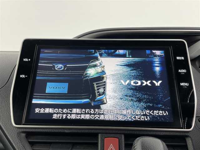 トヨタ ヴォクシー ZS 煌 福井県 2018(平30)年 2.7万km ブラック モデリスタエアロ　/純正１０インチナビ　/ＤＶＤ　Ｂｌｕｅｔｏｏｔｈ　/純正１２．１インチフリップダウンモニター　/純正ドラレコ　/ＥＴＣ２．０　/トヨタセーフティセンス/レザー調シートカバー　/両側パワースライドドア　/クルコン /フルセグ　/バックカメラ