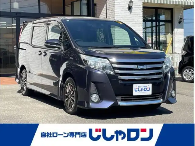 トヨタ ノア Si 高知県 2014(平26)年 11.9万km ダークバイオレットマイカメタリック (株)IDOMが運営する【じしゃロン高知店】の自社ローン専用車両になります。こちらは現金またはオートローンご利用時の価格です。自社ローンご希望の方は別途その旨お申付け下さい