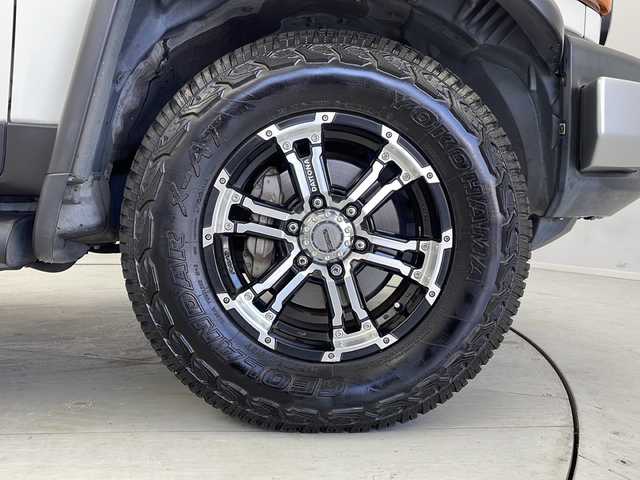 トヨタ ＦＪクルーザー 茨城県 2014(平26)年 10.7万km ホワイト 純正ナビ　バックモニター　ＥＴＣ　ドラレコ　ＬＥＤライト　フォグランプ　衝突被害軽減ブレーキ　横滑り防止装置　コーナーセンサー　ＲＡＹＳ１７インチアルミホイール　純正フロアマット　ルーフレール