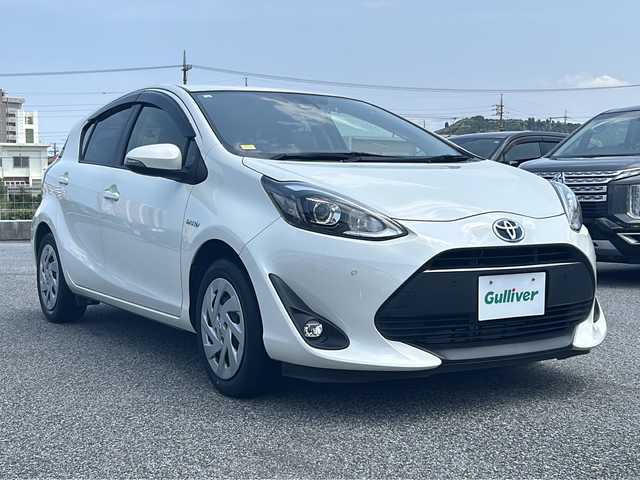トヨタ アクア G 沖縄県 2019(平31)年 5.8万km ホワイトパールクリスタルシャイン 禁煙車　/ＥＴＣ　/ＬＥＤヘッドライト　/バックカメラ　/クルーズコントロール　/前後コーナーセンサー　/前後ドラレコ　/オートマチックハイビーム　/純正ＳＤナビＡＭ／ＦＭ／ＢＴ　/フルセグテレビ　/衝突被害軽減システム