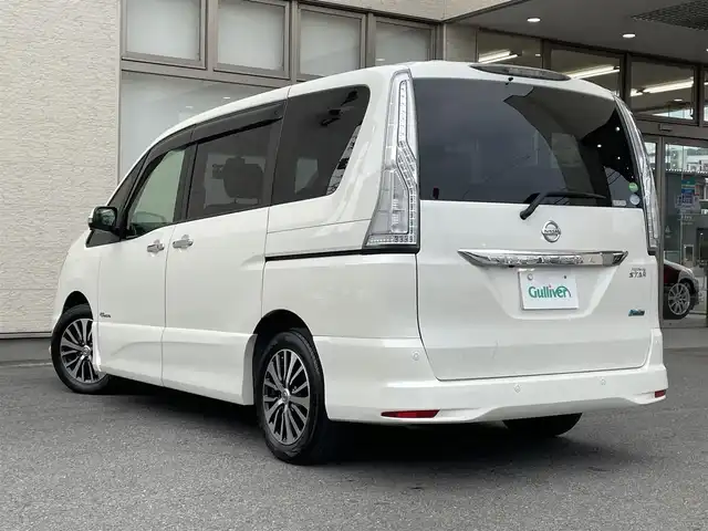 日産 セレナ HWS S HV Vセレ +SeftyⅡ 大阪府 2015(平27)年 11.9万km ブリリアントホワイトパール 純正SDナビ/（フルセグ/BT/CD/DVD）/フリップダウンモニター/バックカメラ/全方位カメラ/両側パワースライドドア/クルーズコントロール/レーンキープアシスト/エマージェンシーブレーキ/アイドリングストップ/横滑り防止システム/前後コーナーセンサー/前後ドライブレコーダー/純正16インチAW/ETC/プッシュスタート/保証書/取扱説明書/スペアキー　有