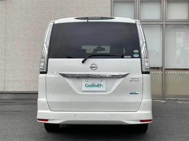 日産 セレナ HWS S HV Vセレ +SeftyⅡ 大阪府 2015(平27)年 11.9万km ブリリアントホワイトパール 純正SDナビ/（フルセグ/BT/CD/DVD）/フリップダウンモニター/バックカメラ/全方位カメラ/両側パワースライドドア/クルーズコントロール/レーンキープアシスト/エマージェンシーブレーキ/アイドリングストップ/横滑り防止システム/前後コーナーセンサー/前後ドライブレコーダー/純正16インチAW/ETC/プッシュスタート/保証書/取扱説明書/スペアキー　有