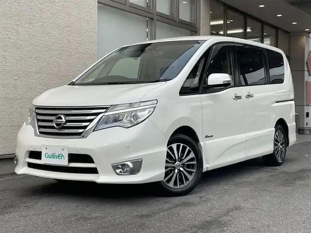 日産 セレナ HWS S HV Vセレ +SeftyⅡ 大阪府 2015(平27)年 11.9万km ブリリアントホワイトパール 純正SDナビ/（フルセグ/BT/CD/DVD）/フリップダウンモニター/バックカメラ/全方位カメラ/両側パワースライドドア/クルーズコントロール/レーンキープアシスト/エマージェンシーブレーキ/アイドリングストップ/横滑り防止システム/前後コーナーセンサー/前後ドライブレコーダー/純正16インチAW/ETC/プッシュスタート/保証書/取扱説明書/スペアキー　有