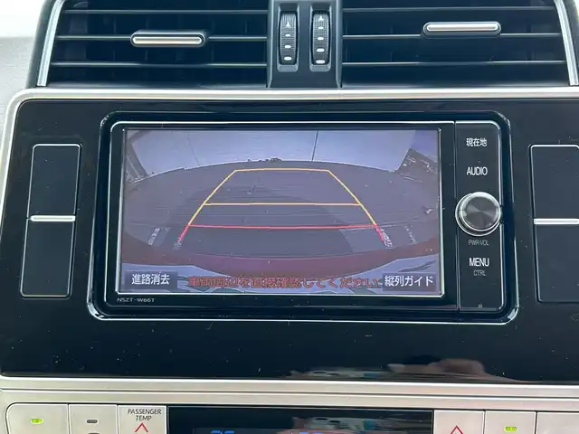 トヨタ ランドクルーザー プラド TX Lパッケージ 千葉県 2017(平29)年 7.8万km レッドマイカメタリック 7人乗 ナビNSZT-W66T バックカメラ ベージュ革 エアシート シートヒーター PCS LDA AHB クルコン 2ndスタート LEDライト オートライト リアスポ サイドステップ 17AW
