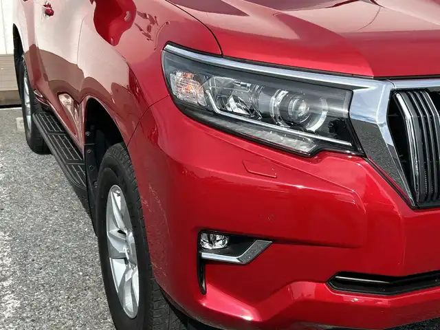 トヨタ ランドクルーザー プラド TX Lパッケージ 千葉県 2017(平29)年 7.8万km レッドマイカメタリック 7人乗 ナビNSZT-W66T バックカメラ ベージュ革 エアシート シートヒーター PCS LDA AHB クルコン 2ndスタート LEDライト オートライト リアスポ サイドステップ 17AW