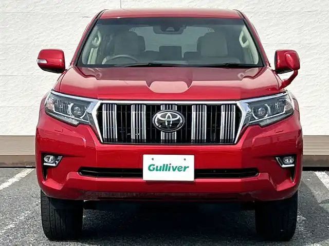 トヨタ ランドクルーザー プラド TX Lパッケージ 千葉県 2017(平29)年 7.8万km レッドマイカメタリック 7人乗 ナビNSZT-W66T バックカメラ ベージュ革 エアシート シートヒーター PCS LDA AHB クルコン 2ndスタート LEDライト オートライト リアスポ サイドステップ 17AW