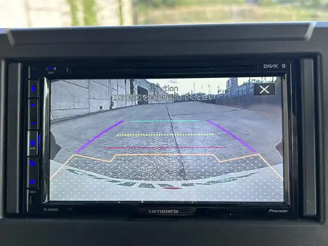 スズキ ジムニー シエラ JC 長崎県 2024(令6)年 1.2万km ピュアホワイトP ワンオーナー/社外ディスプレイオーディオ/（CD/DVD/BT）/バックカメラ/衝突軽減システム/レーンアシスト/シートヒーター/オートライト/前後ドライブレコーダー/スマートキー/プッシュスタート/純正15インチAW