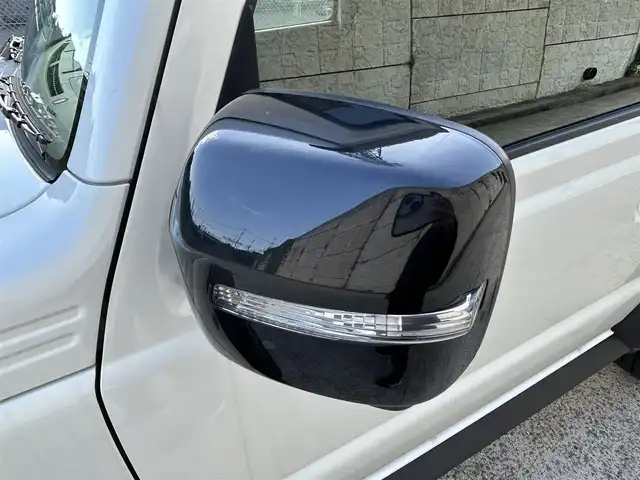 スズキ ジムニー シエラ JC 長崎県 2024(令6)年 1.2万km ピュアホワイトP ワンオーナー/社外ディスプレイオーディオ/（CD/DVD/BT）/バックカメラ/衝突軽減システム/レーンアシスト/シートヒーター/オートライト/前後ドライブレコーダー/スマートキー/プッシュスタート/純正15インチAW