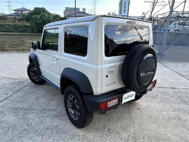 スズキ ジムニー シエラ JC 長崎県 2024(令6)年 1.2万km ピュアホワイトP ワンオーナー/社外ディスプレイオーディオ/（CD/DVD/BT）/バックカメラ/衝突軽減システム/レーンアシスト/シートヒーター/オートライト/前後ドライブレコーダー/スマートキー/プッシュスタート/純正15インチAW