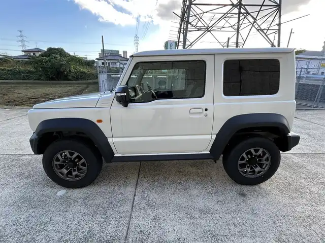 スズキ ジムニー シエラ JC 長崎県 2024(令6)年 1.2万km ピュアホワイトP ワンオーナー/社外ディスプレイオーディオ/（CD/DVD/BT）/バックカメラ/衝突軽減システム/レーンアシスト/シートヒーター/オートライト/前後ドライブレコーダー/スマートキー/プッシュスタート/純正15インチAW