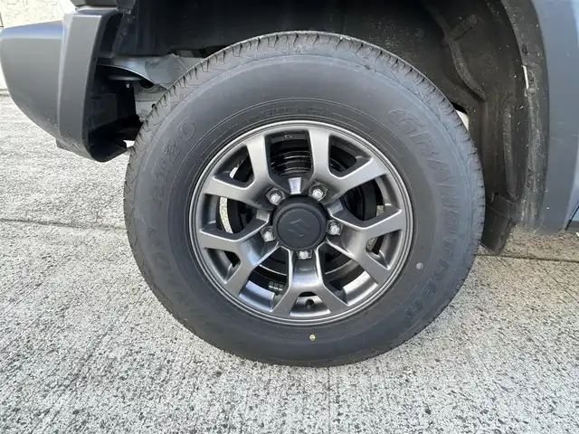 スズキ ジムニー シエラ JC 長崎県 2024(令6)年 1.2万km ピュアホワイトP ワンオーナー/社外ディスプレイオーディオ/（CD/DVD/BT）/バックカメラ/衝突軽減システム/レーンアシスト/シートヒーター/オートライト/前後ドライブレコーダー/スマートキー/プッシュスタート/純正15インチAW