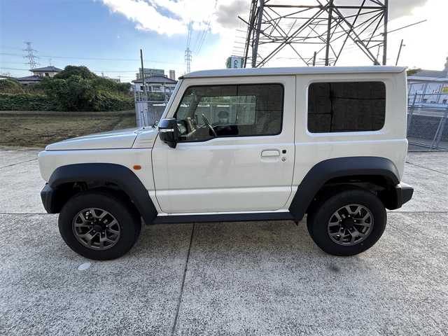 スズキ ジムニー シエラ JC 長崎県 2024(令6)年 1.2万km ピュアホワイトP ワンオーナー/社外ディスプレイオーディオ/（CD/DVD/BT）/バックカメラ/衝突軽減システム/レーンアシスト/シートヒーター/オートライト/前後ドライブレコーダー/スマートキー/プッシュスタート/純正15インチAW
