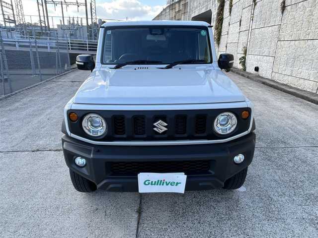 スズキ ジムニー シエラ JC 長崎県 2024(令6)年 1.2万km ピュアホワイトP ワンオーナー/社外ディスプレイオーディオ/（CD/DVD/BT）/バックカメラ/衝突軽減システム/レーンアシスト/シートヒーター/オートライト/前後ドライブレコーダー/スマートキー/プッシュスタート/純正15インチAW