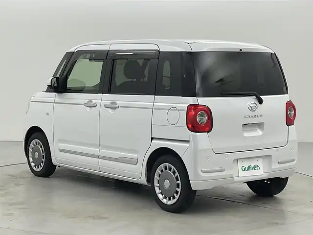 ダイハツ ムーヴ キャンバス セオリー G 福岡県 2023(令5)年 1.1万km シャイニングホワイトパール 社外ナビ／フルセグＴＶ　/バックカメラ　/ホットカップホルダー　/ＥＴＣ　/前後ドラレコ　/コーナーセンサー　/衝突軽減ブレーキ　/横滑り防止装置　/アイドリングストップ　/シートヒーター　/両側電動スライドドア　/ＬＥＤヘッドライト