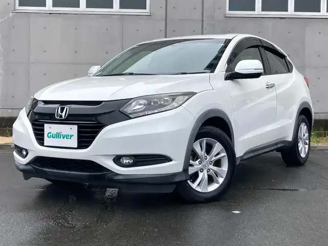 ホンダ ヴェゼル X ホンダセンシング 静岡県 2017(平29)年 5.7万km ホワイトオーキッドパール HondaSENSING/純正8インチナビ(VXM-175VFEi)/　AM FM CD DVD Bluetooth USB SD HDMI/ビルトインETC/バックモニター/LEDオートヘッドランプ/レーダークルーズコントロール/オートブレーキホールド/純正16インチアルミホイール/スマートキー2本/パーキングアシスト/ワンオーナー/フルセグTV