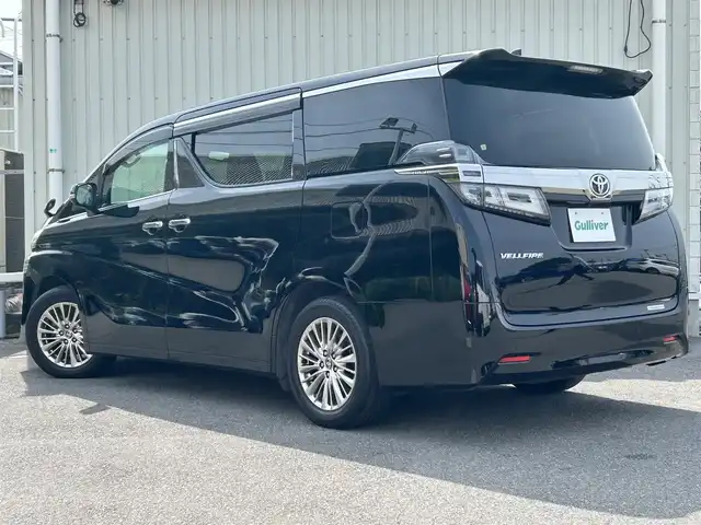 トヨタ ヴェルファイア V 山形県 2020(令2)年 7.6万km ブラック トヨタセーフティセンス/7人乗り/両側パワースライドドア/純正ナビ/　【USB BTMiracast】/バックカメラ/レザーシート/シートヒーター・エアシート/パワーシート/ETC２．０/ステアリングスイッチ/レーダークルーズコントロール/オットマン/キャプテンシート/コーナーセンサー/LEDライト/フォグランプ/ウィンカーミラー/純正フロアマット