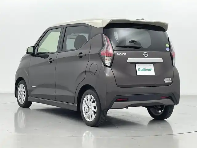 日産 デイズ HWS X プロパイロットED 熊本県 2021(令3)年 2.3万km フローズンバニラパール/アッシュブラウンM 純正9型ナビMM320D-L（AM/FM/CD/DVD/TV）/Bluetooth接続/フルセグTV/アラウンドビューモニター/バックカメラ/プロパイロット/レーダークルーズコントロール/アイドリングストップ/ETC/電動パーキングブレーキ/オートホールド/純正前方ドライブレコーダー/前後コーナーセンサー/エマージェンシーブレーキ/車線逸脱警報/車線逸脱防止支援システム/先行車発進お知らせ機能/標識認識機能/ふらつき警報機能/横滑り防止装置/純正フロアマット/純正15インチアルミホイール/オートライト/オートマチックハイビーム/LEDヘッドライト/スマートキー/プッシュスタート/スペアキー1本